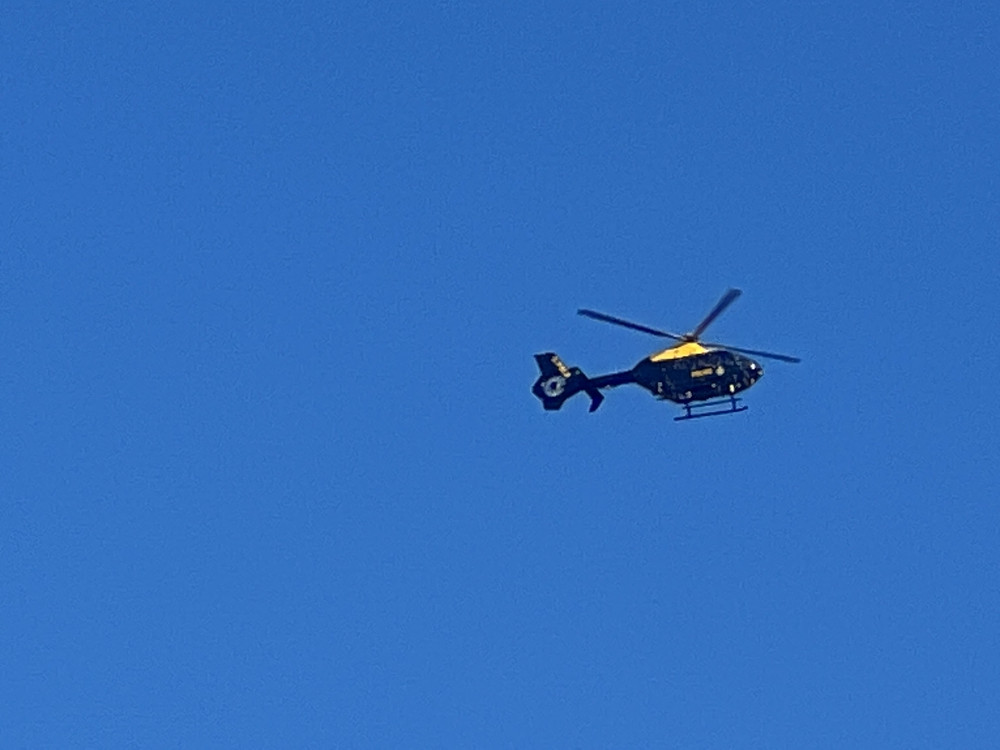 The police helicopter called to support a large number of police vehicles in Hitchin on Monday evening following reports of a fight among youngsters. CREDIT: Nub News