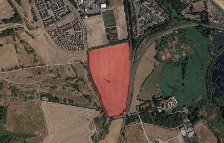 The area shaded in red is the potential site for 190 new homes.