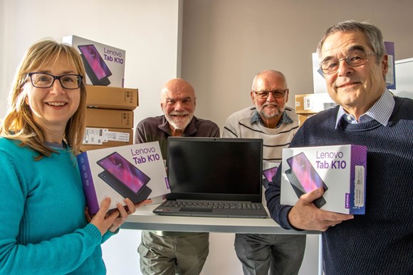 Some of Dorset Council's volunteer digital champions pictured with the laptops and tablets that will be given to residents who are referred to its Digital Doorway scheme