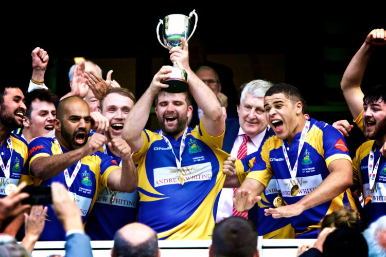 Bobby Thompson lifts the RFU Intermediate Cup at Twickenham in May 2019 (image via Willie Whitesmith)