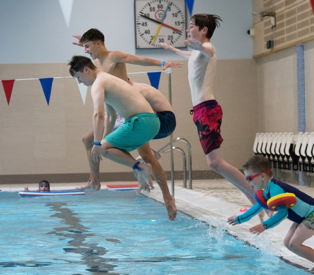 Boys jump with delight in Easter half-term break (Picture: Simon Lee)