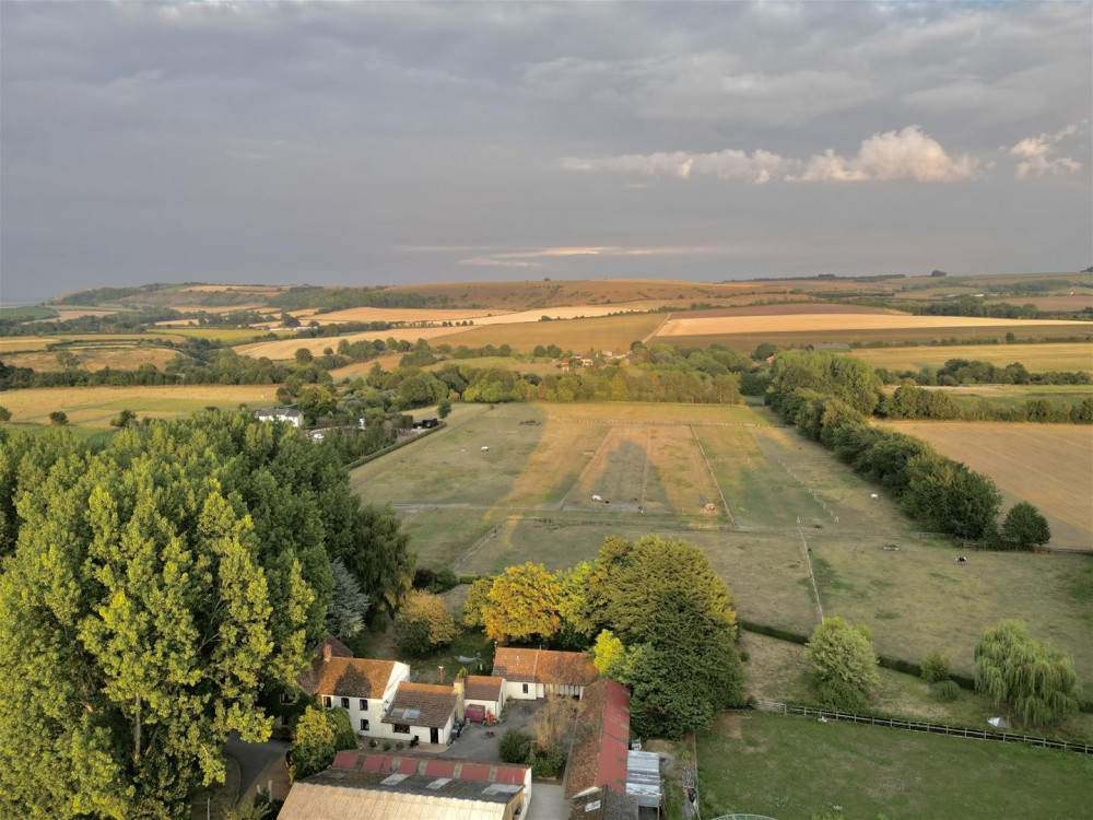 Within rolling countryside, perfect for the horse lover