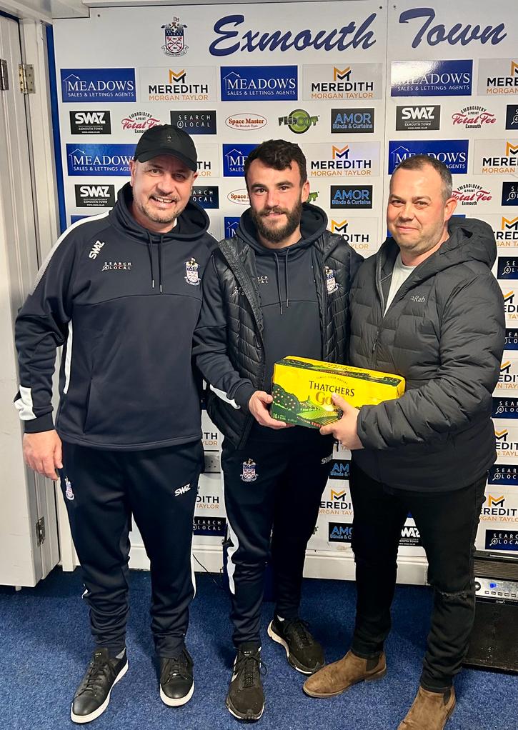 Man-of-the-match Callum Shipton (middle) being presented by match day sponsors A 1 Ariel’s (Exmouth Town FC)