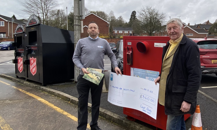 Ashby Co-op store manager Richard Walton with Helipads for Hospitals founder John Nowell and the Big Red Bin. Photo: Ashby Nub News