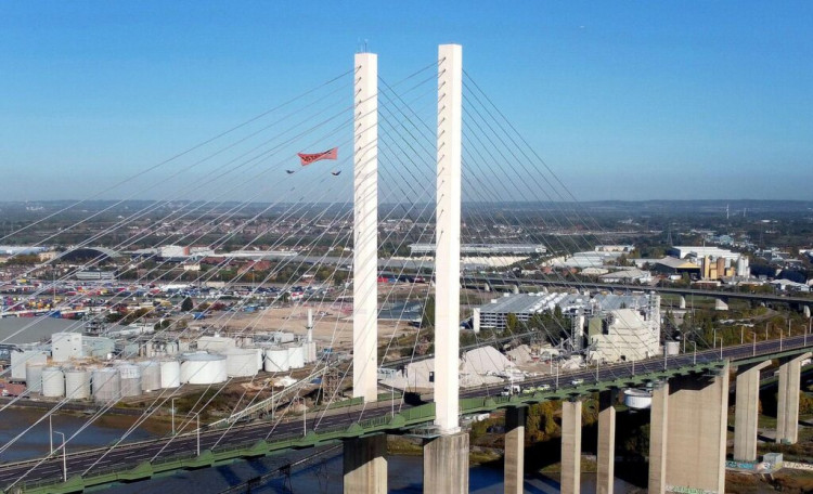 The two men scaled the QEII Bridge. 