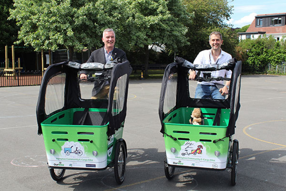  Council leader, Gareth Roberts, and Chair of the Council's Transport and Air Quality Services Committee, Alexander Ehmann, try out cargo bikes (credit Richmond Council)