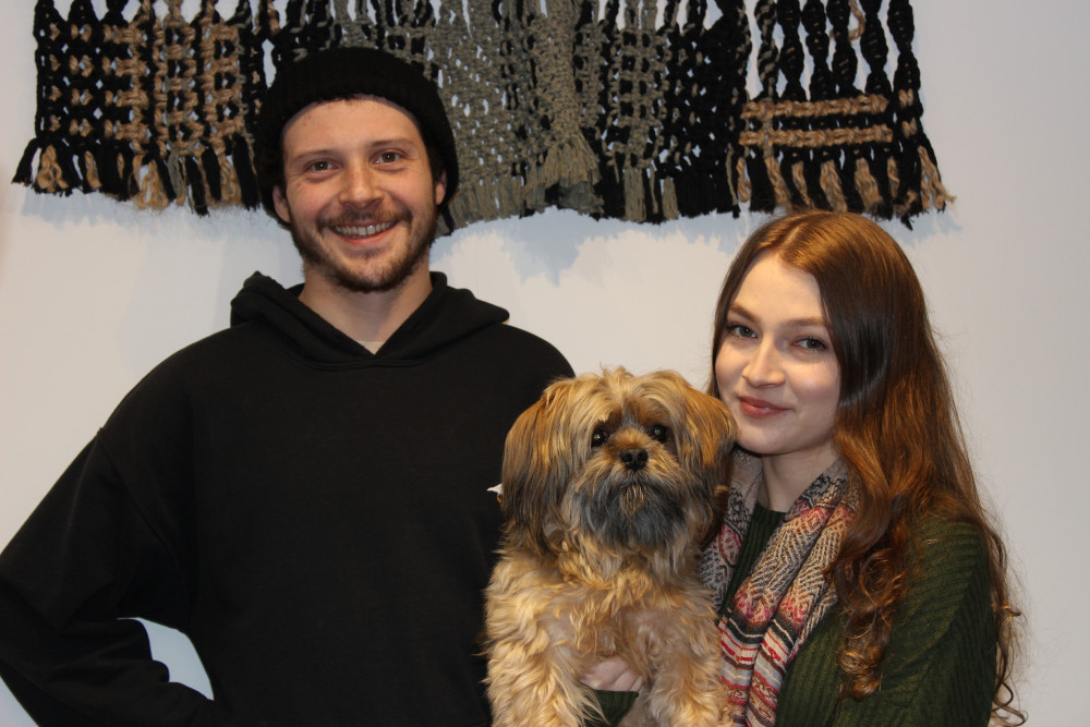 Ted (left), Elle (right) and their dog Puddin (centre). The latter of which, is available for cuddles. (Image - Alexander Greensmith / Macclesfield Nub News)