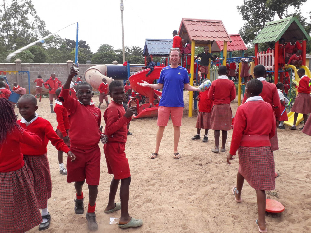 Alsager School's Paul Buttery with the Kenyan children. 