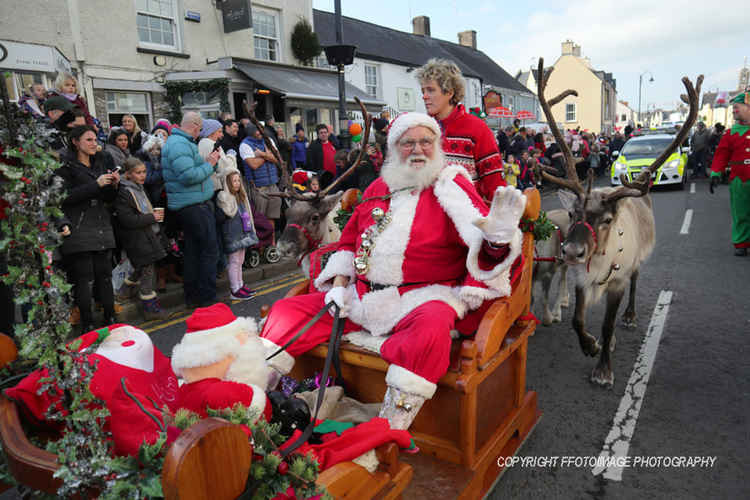 Santa and his reindeer parade through Cowbridge