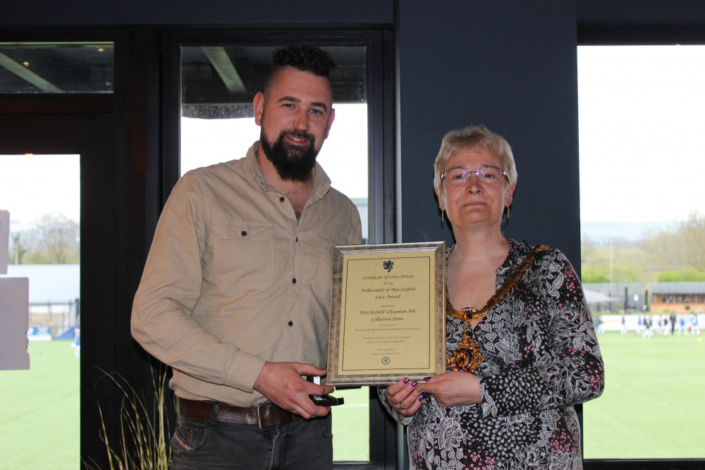 Thomas Jackson (left) with Macclesfield Mayor Fiona Wilson. Jackson - who has Ukrainian ancestry - along with his fellow family and volunteer have sent almost 70 vehicles to the country.  (Image - Alexander Greensmith / Macclesfield Nub News) 