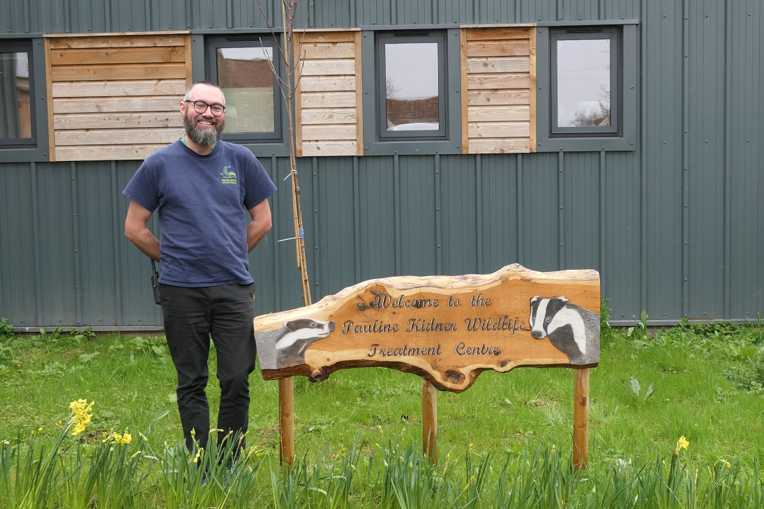 David with Secret World sign