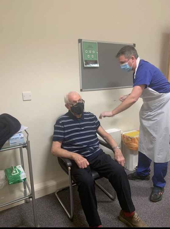 The first patient at Cowbridge and Vale Medical practice receives his Covid vaccination