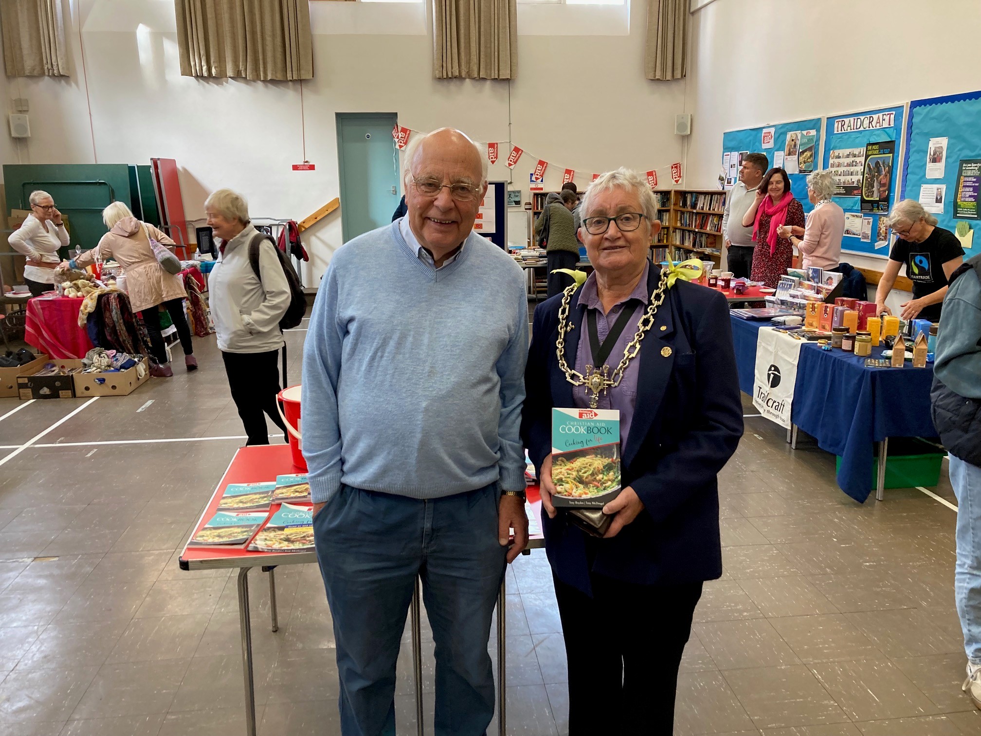 Dorchester and District Christian Air chair Tony Boyden with the Mayor of Dorchester, Cllr Janet Hewitt, and the recipe book Cooking for Life