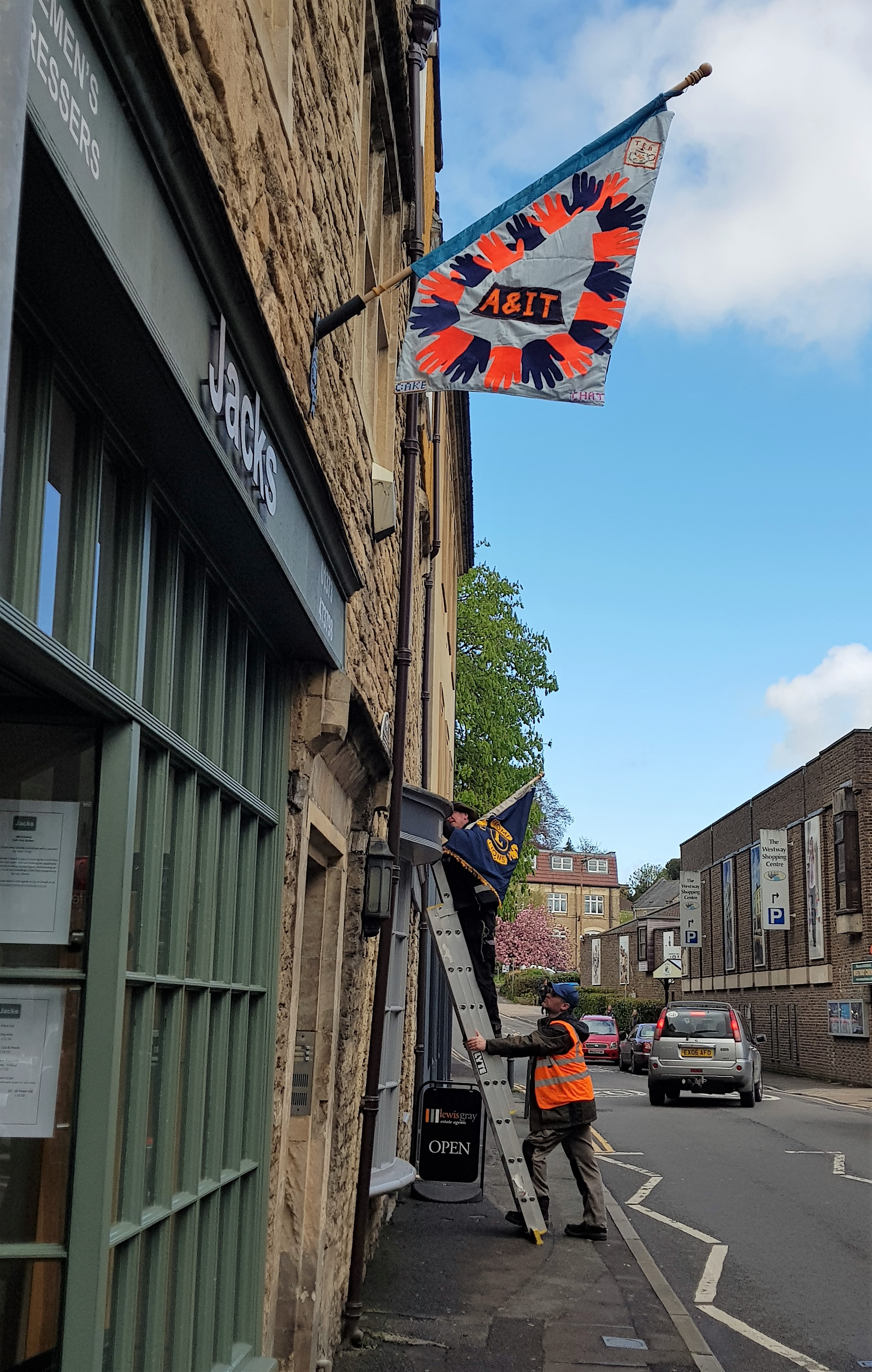 Community Flag being put up.