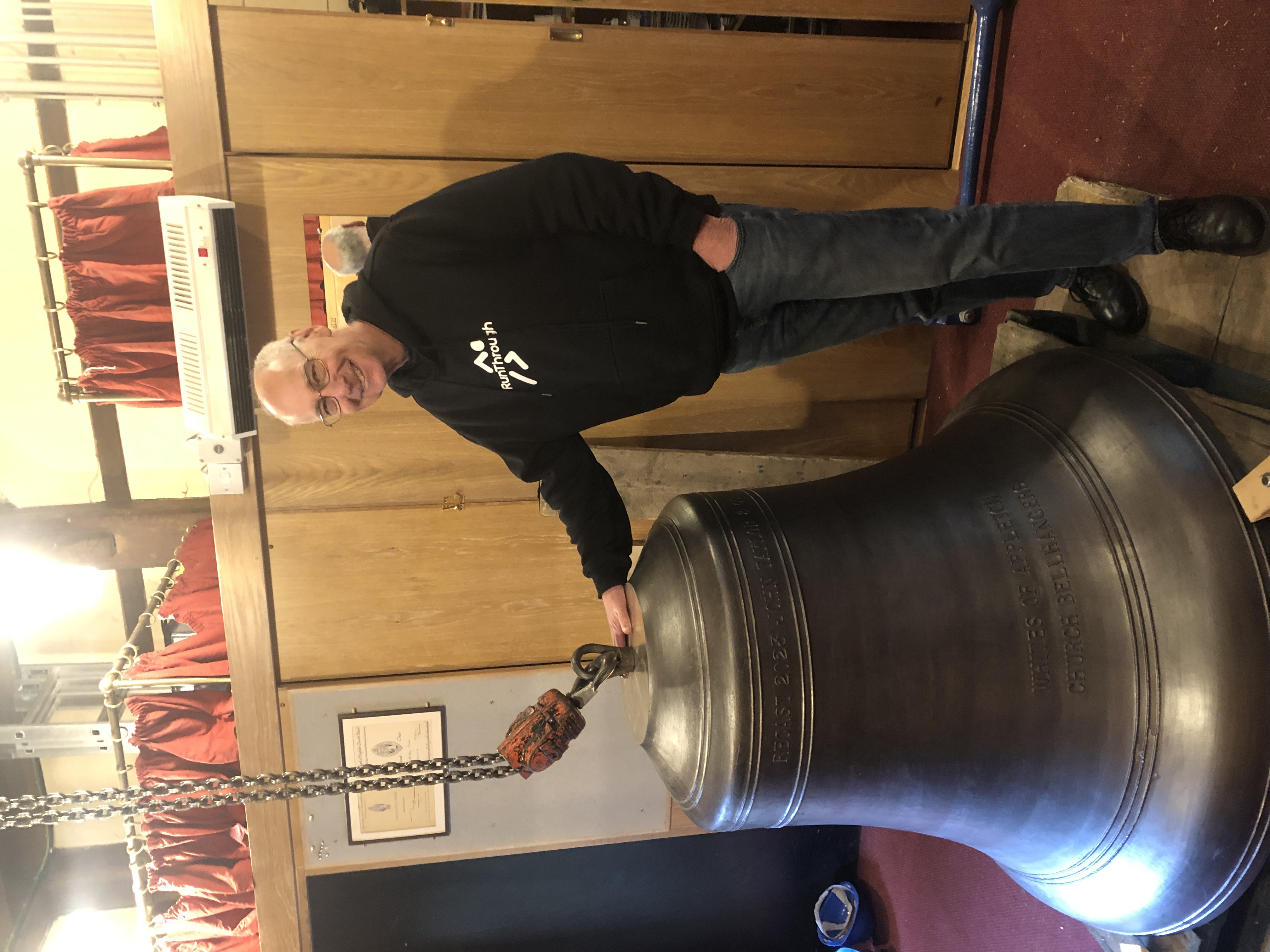 A Churchwarden writes: A new bell arrives at Hitchin's St Mary's Church in time to ring in the King. PICTURE: David Kemp, Captain of the Bellringers with the new bell. CREDIT: St Mary's Church 