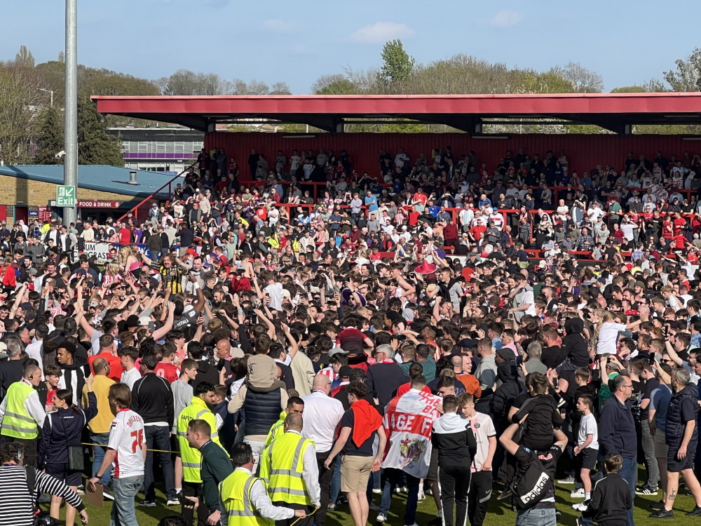 Stevenage fans celebrate their promotion to League One. CREDIT: @laythy29