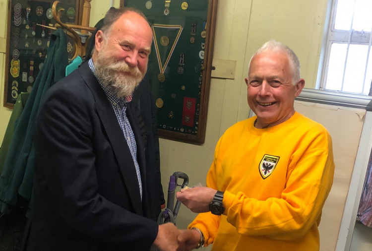 Jon Leech, president of Wimbledon Park Rifle Club, (left) presenting a medal to competitor Keith Ealey (right) (Credit: Bernie Ealey)