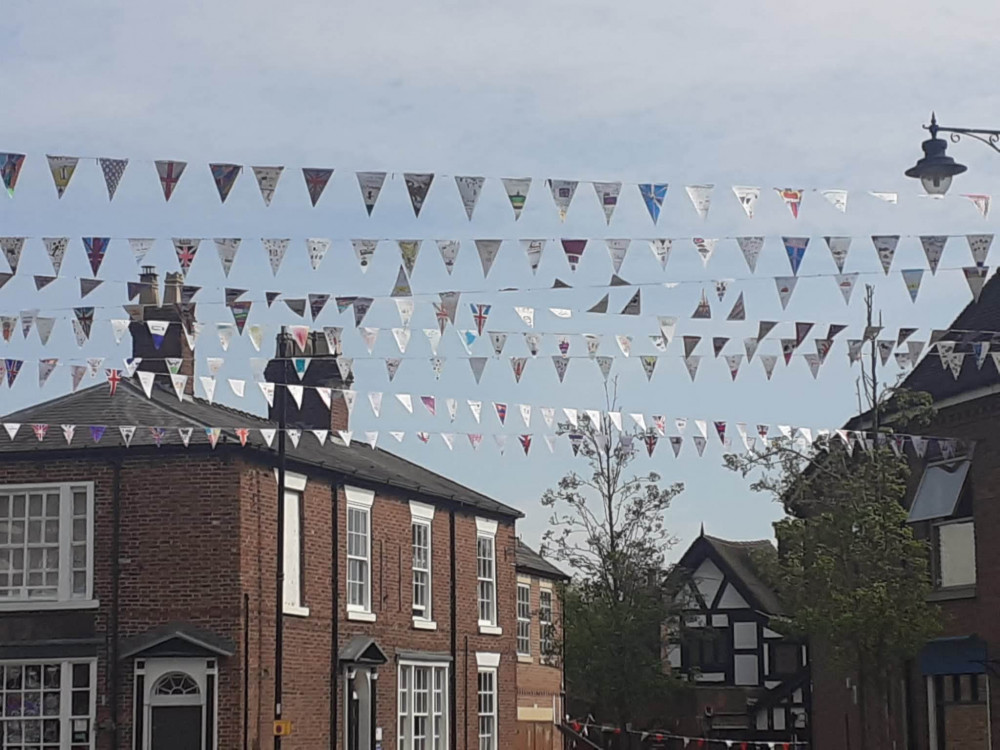 The hand-decorated flags are a wonderful sight in Sandbach.  