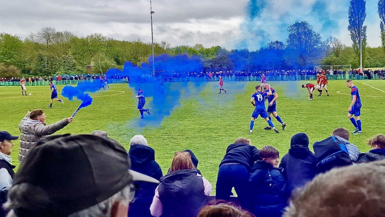 The celebrations were already under way before the final whistle. Photo: Josh Kay