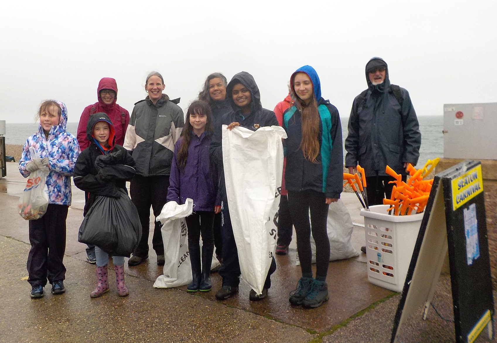 Litter pickers gather on Seaton seafront for the Big Help Out (photo credit: Peter Burrows)