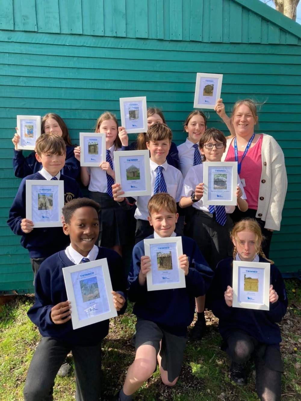 St Osmund’s CE Middle School in Dorchester with some of their Toilet Twinning certificates