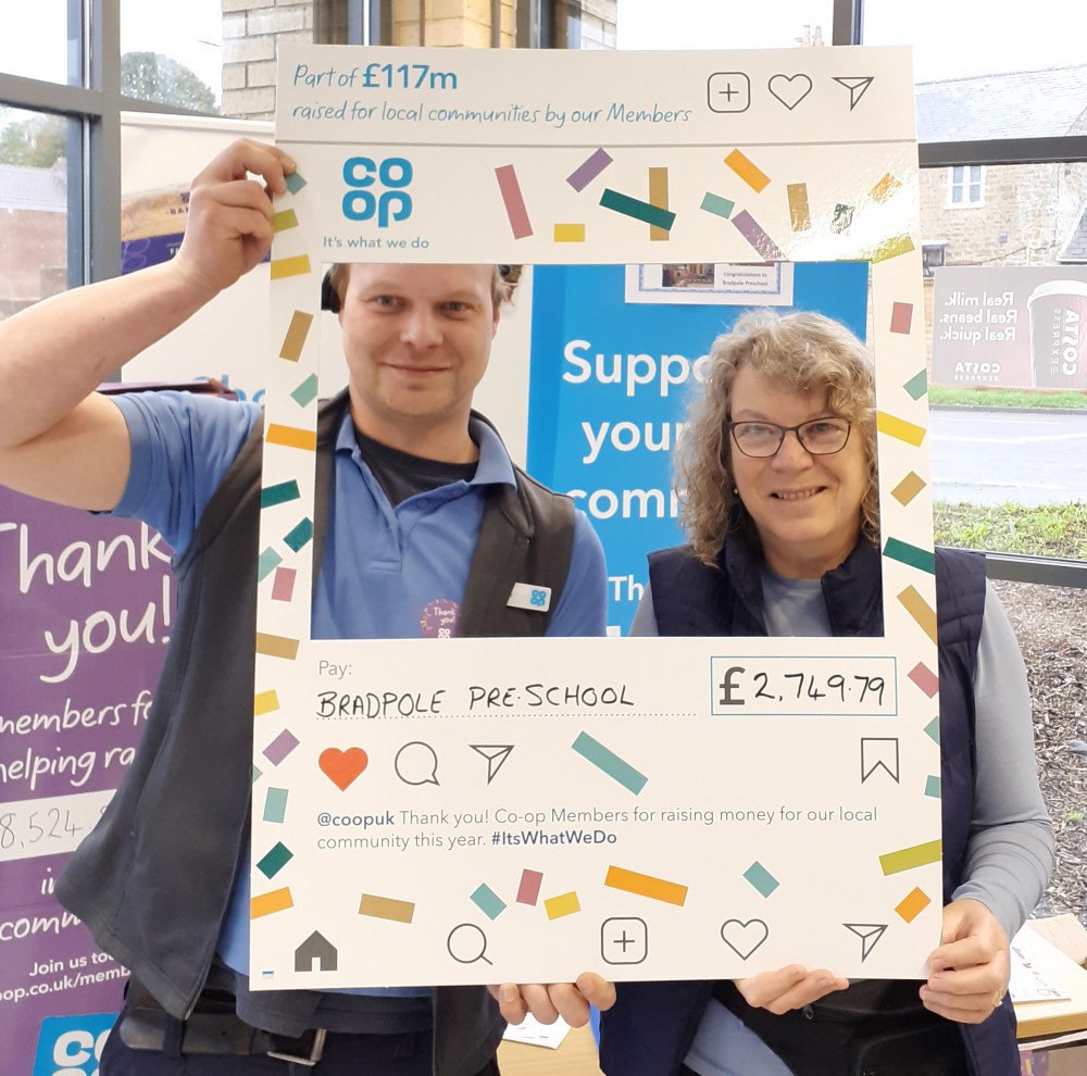 Previous Co-op local cause Bradpole Pre-School collects cash for a garden project at the Bridport store