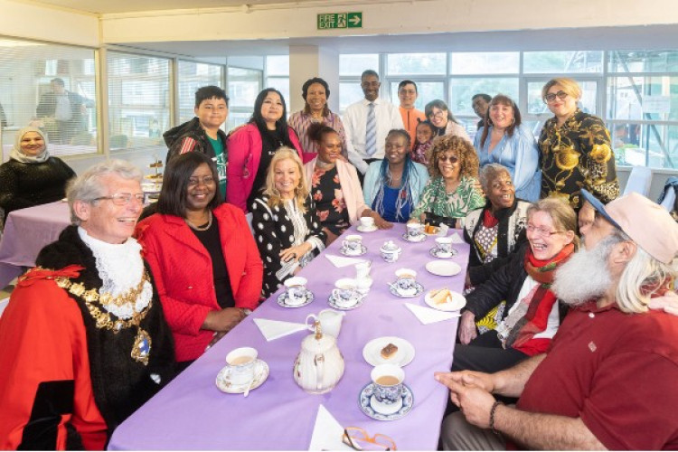 US Ambassador Jane Hartley (third from left) chats with residents at Battersea's Doddington and Rollo estates (Credit: Wandsworth Council)