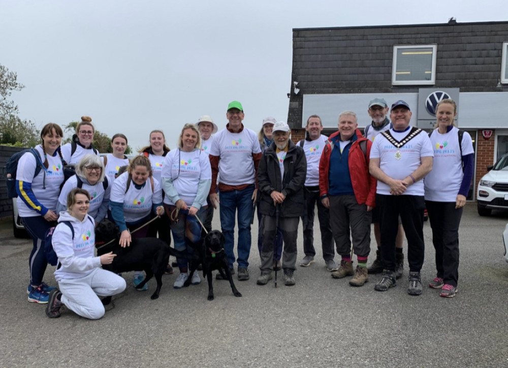 Jim and Gordon with a team from Bupa Dental Care and others. CREDIT: Helping Herts 