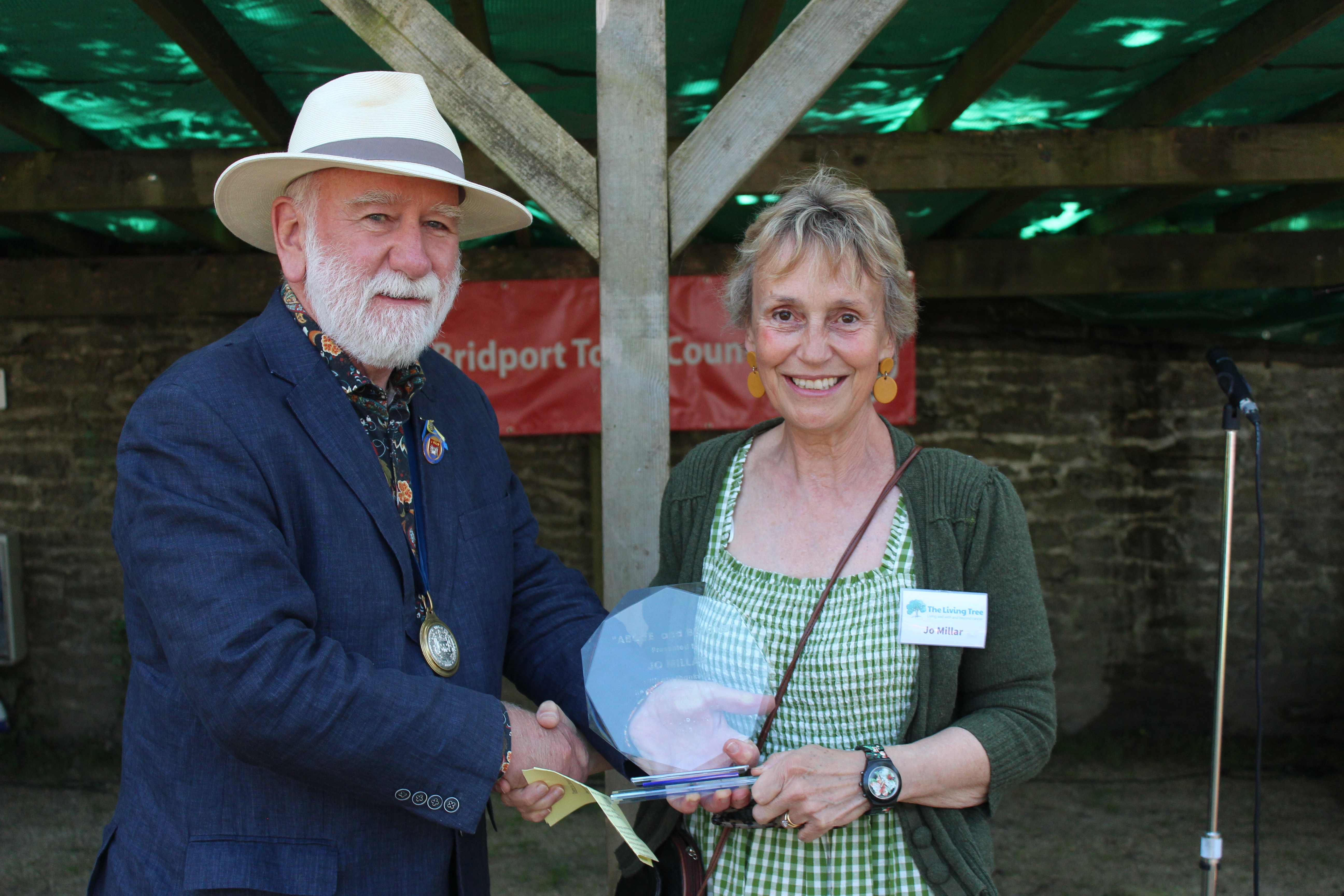 Cllr Ian Bark presents the Above and Beyong Award to Dr Jo Millar