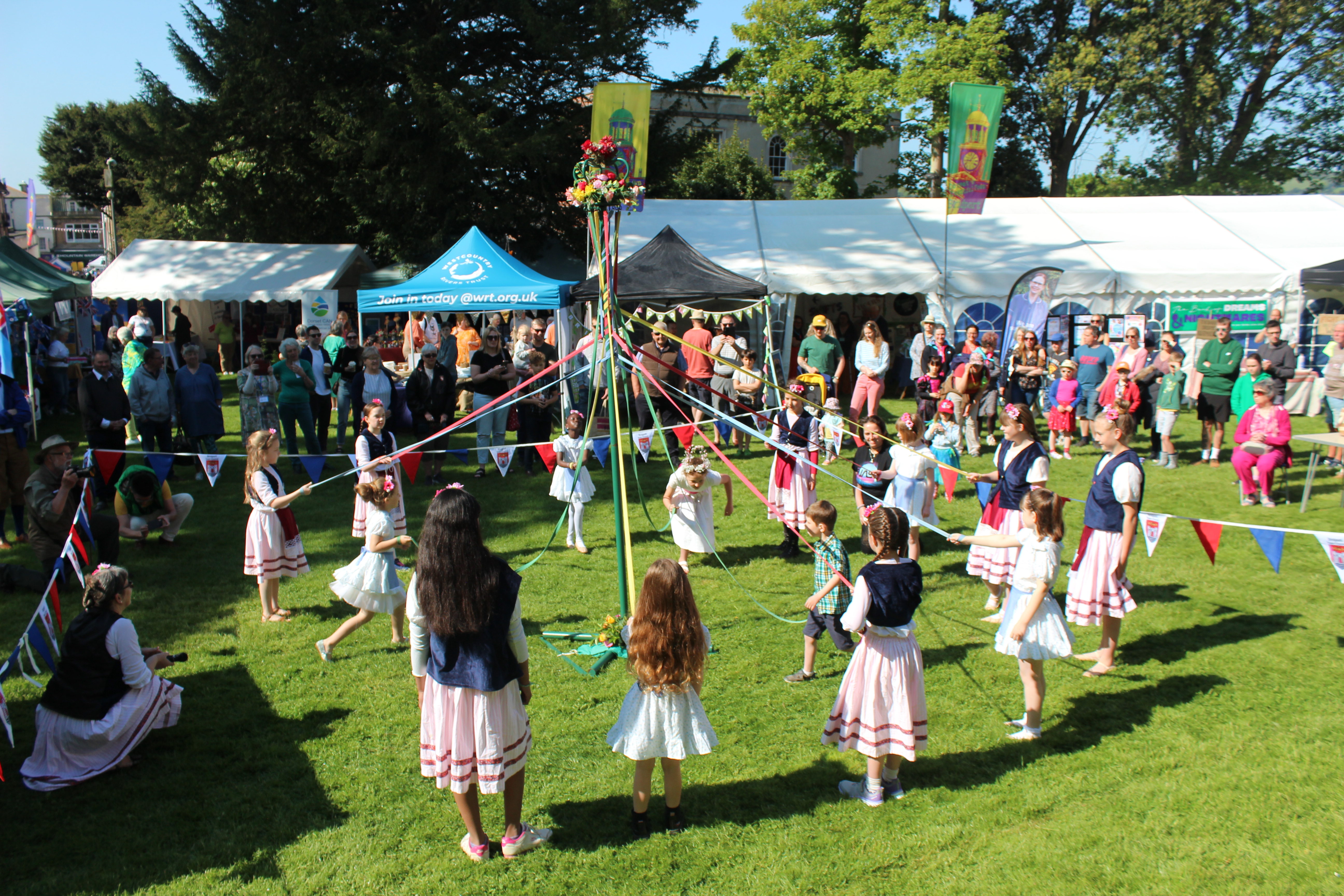 The Lyric School of Dancing got celebrations underway with maypole dancing