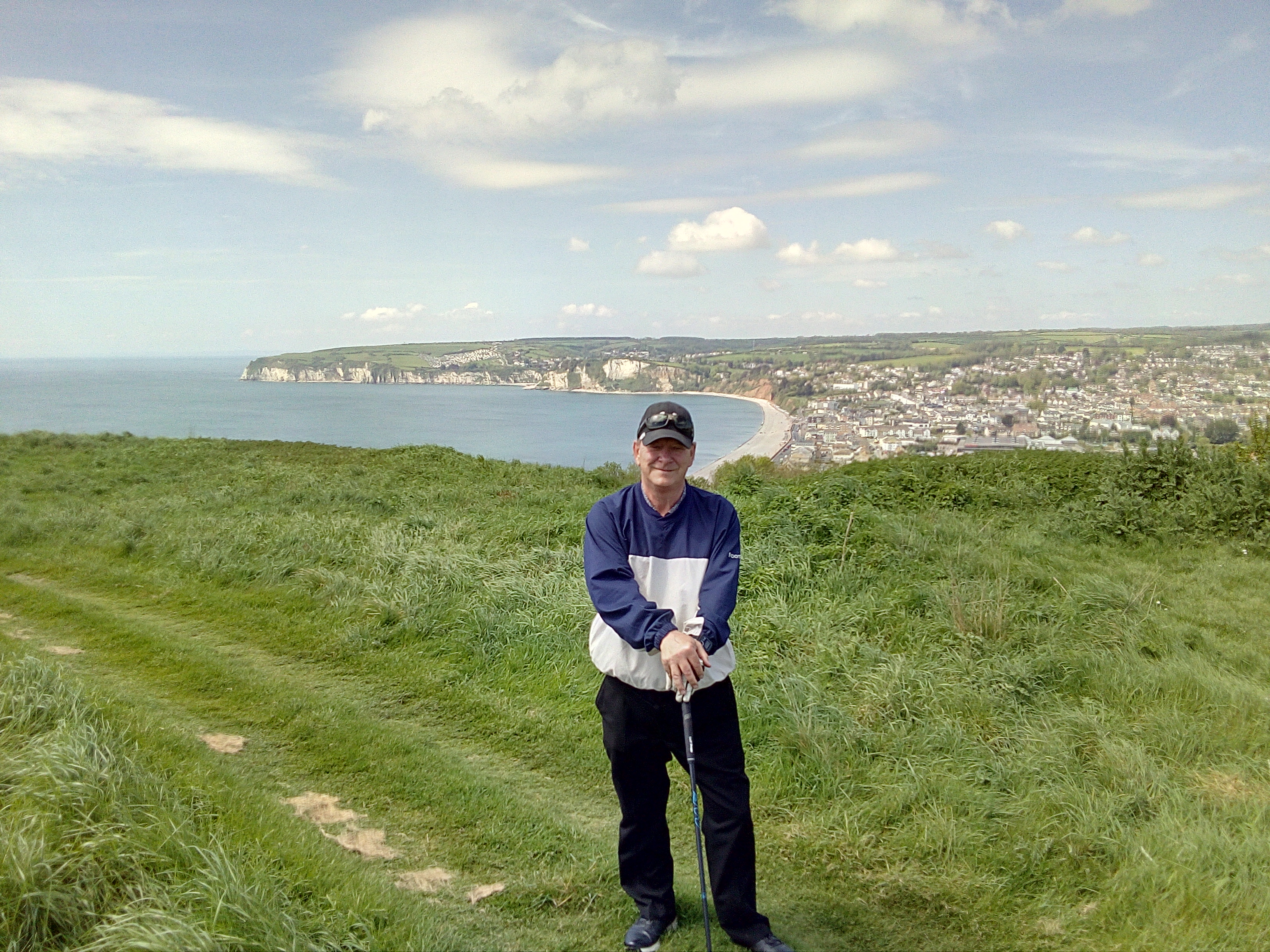 Richard Chambers  overlooking Seaton Bay from the Axe Cliff 10th tee.