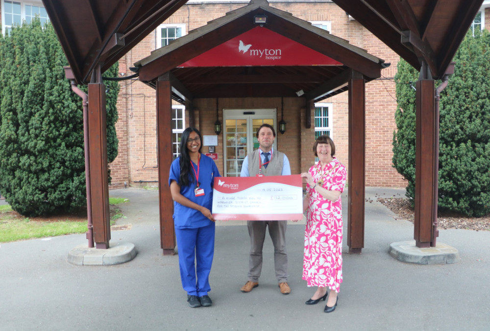 From left - Myton Hospices’ Dr Kumar and Partnerships Manager Chris Willmott, Chairman of WDC Cllr Sidney Syson (image via Warwick District Council)