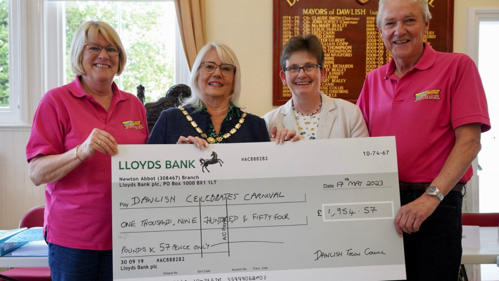 Dawlish Celebrates Carnival receiving cheque (Bob Simpson)