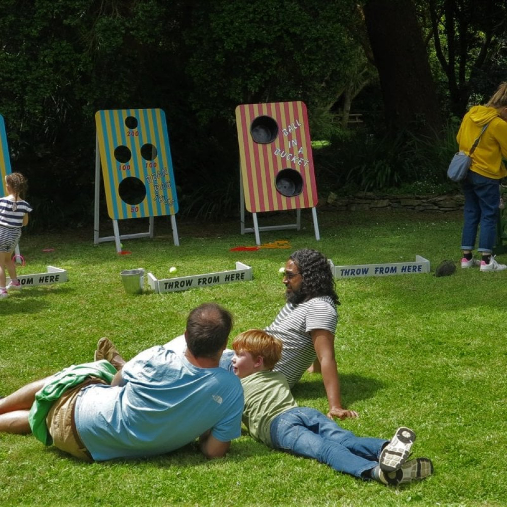 Families playing games in the gardens on Falmouth Campus (Image: Katie Murphy)