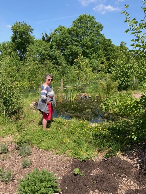 Carole Ballm at the Lake in the Agro Forest, looking for Dragon Flies of which there were many (Winnie Cameron)