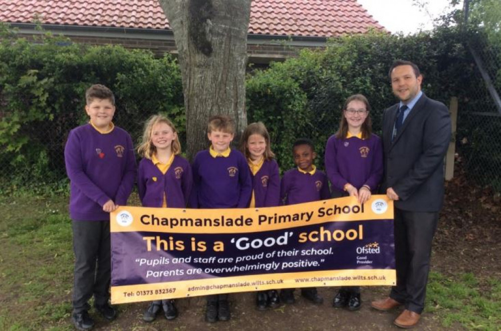 Mr Cottrell and several Chapmanslade pupils