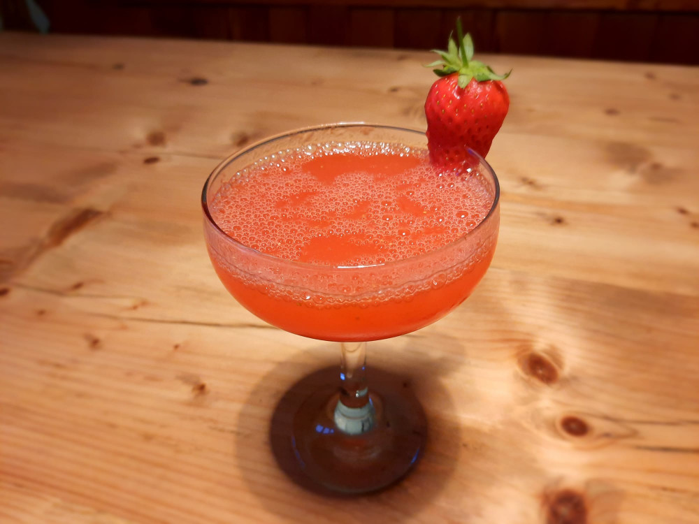 Enjoy your cocktail with a strawberry garnish. Image credit: Josh Tooley. 