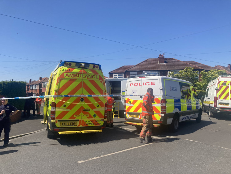 A heavy police presence remains on Middleton Road (Image - Alasdair Perry)