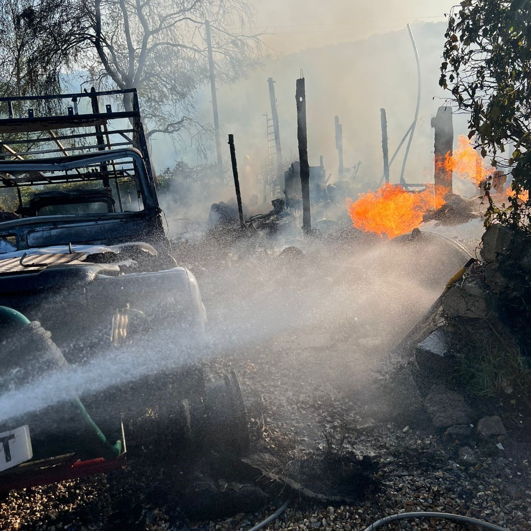 The bonfire destroyed a workshop and a vehicle (Devon and Somerset Fire Service)