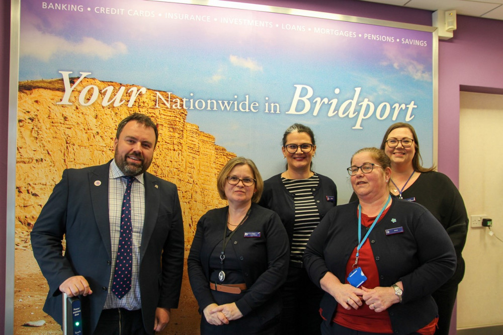 West Dorset MP Chris Loder pictured with staff at the Nationwide Bridport branch 