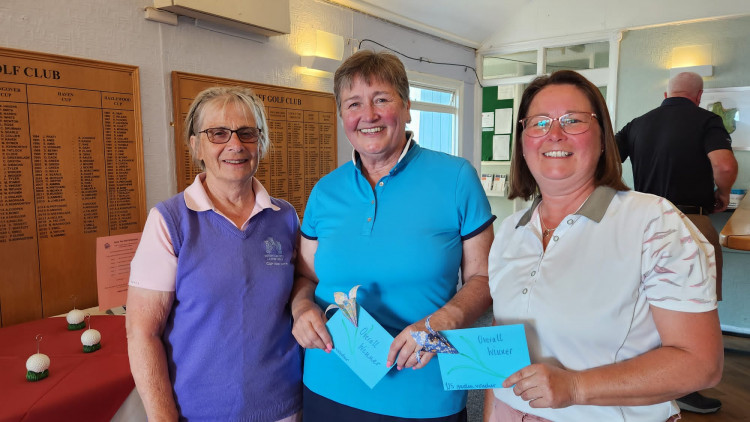  Margaret Kenchington's picture shows the Ladies Invitational winners Karin Cox with Barbara Cummings and Marie  