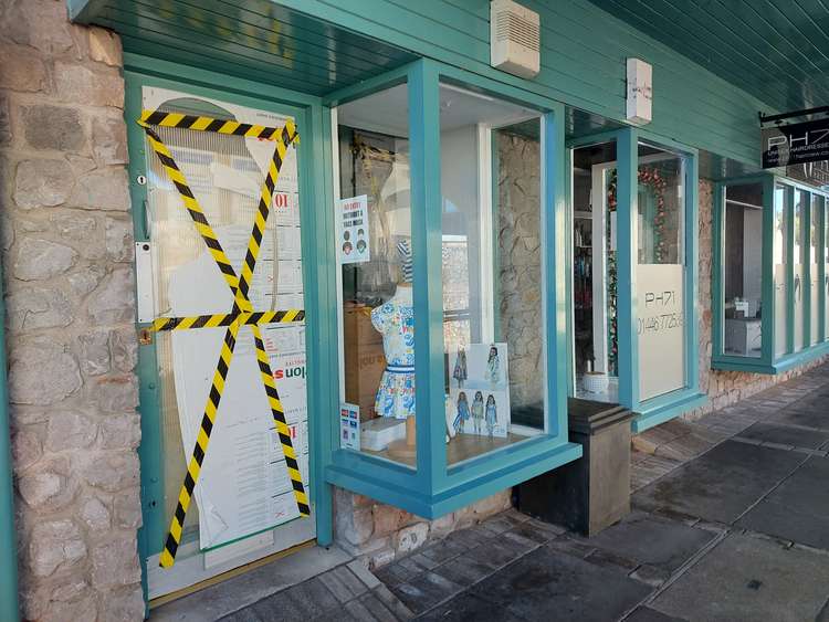 The glass door to Little Sweethearts Childrenswear shop was smashed