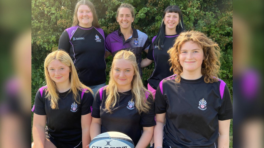 Claudia MacDonald (rear, centre) and players (Exmouth RFC)