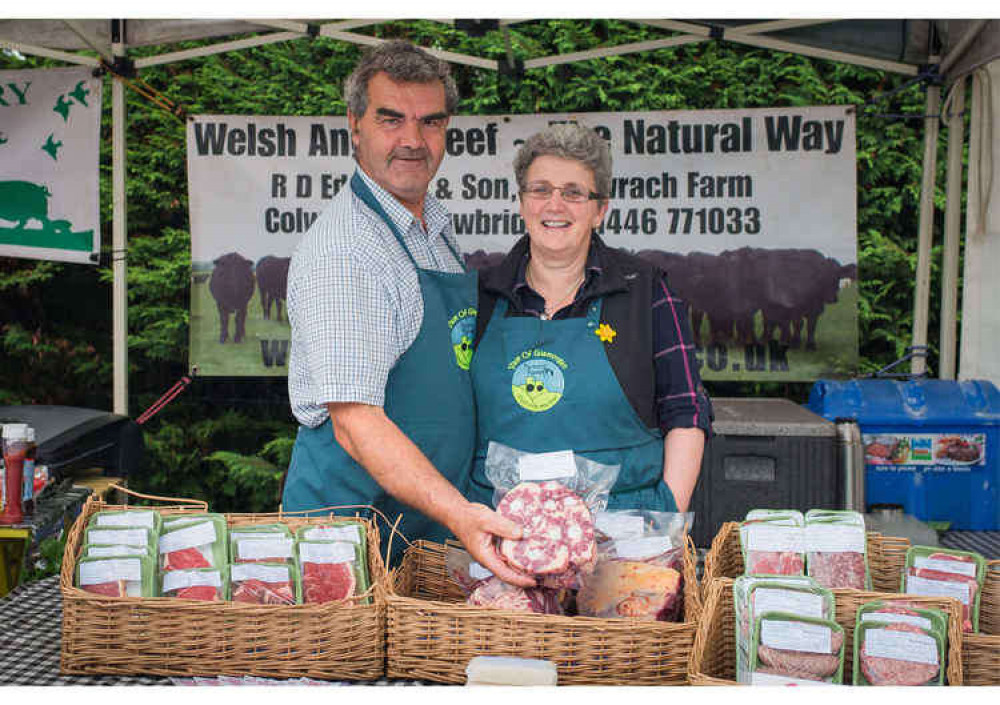 Myfanwy Edwards and her husband at the Cowbridge Farmer's Market (Image via The Food Collective)