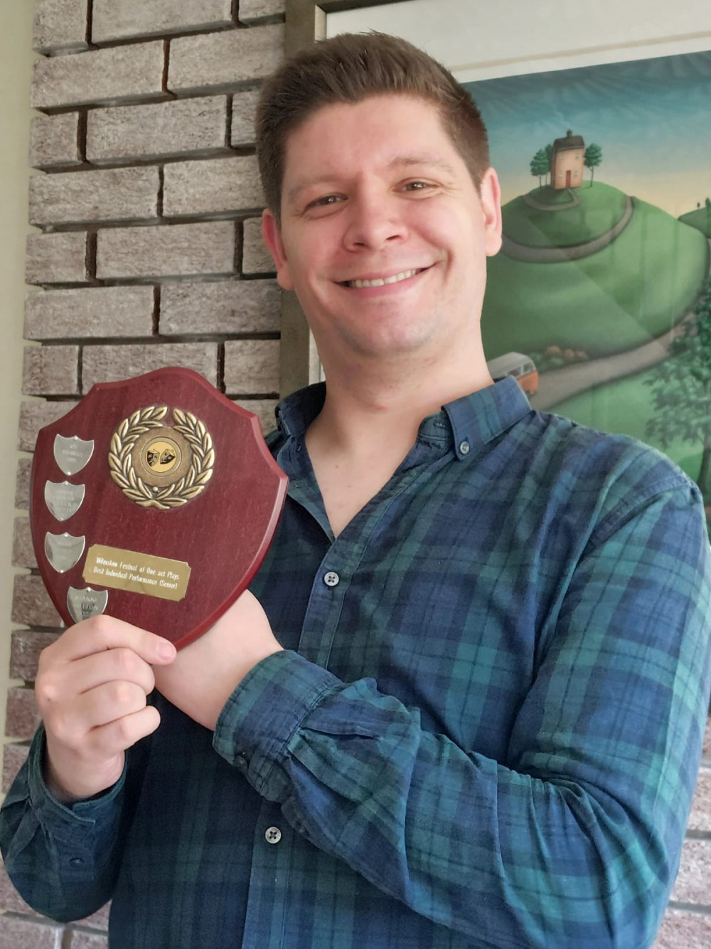 Jon Beagles with his award. (Photo: Saxon Players) 