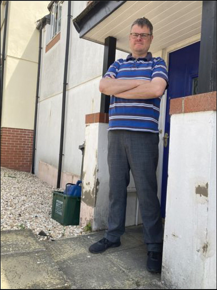 James Coles outside his property in Millbrook Meadows, Axminster