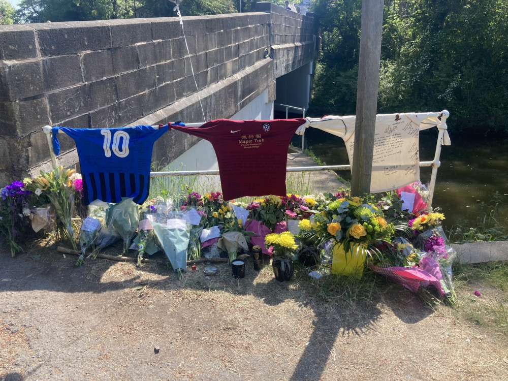 Tributes to Chris Barlow as seen on the Peak Forest Canal (Image - Alasdair Perry)