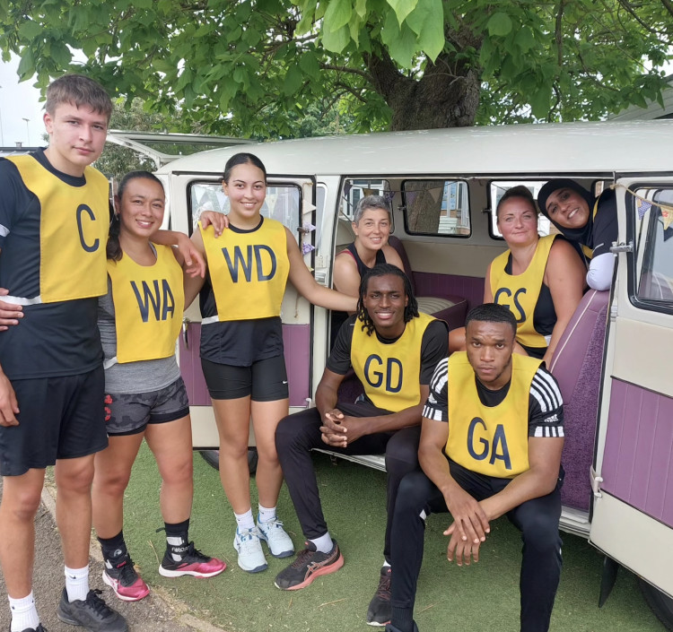 The team in yellow is 'He Shoots, She Scores' pictured in Kate Peto's Lucky Penny VW Camper Van. CREDIT: Supplied 