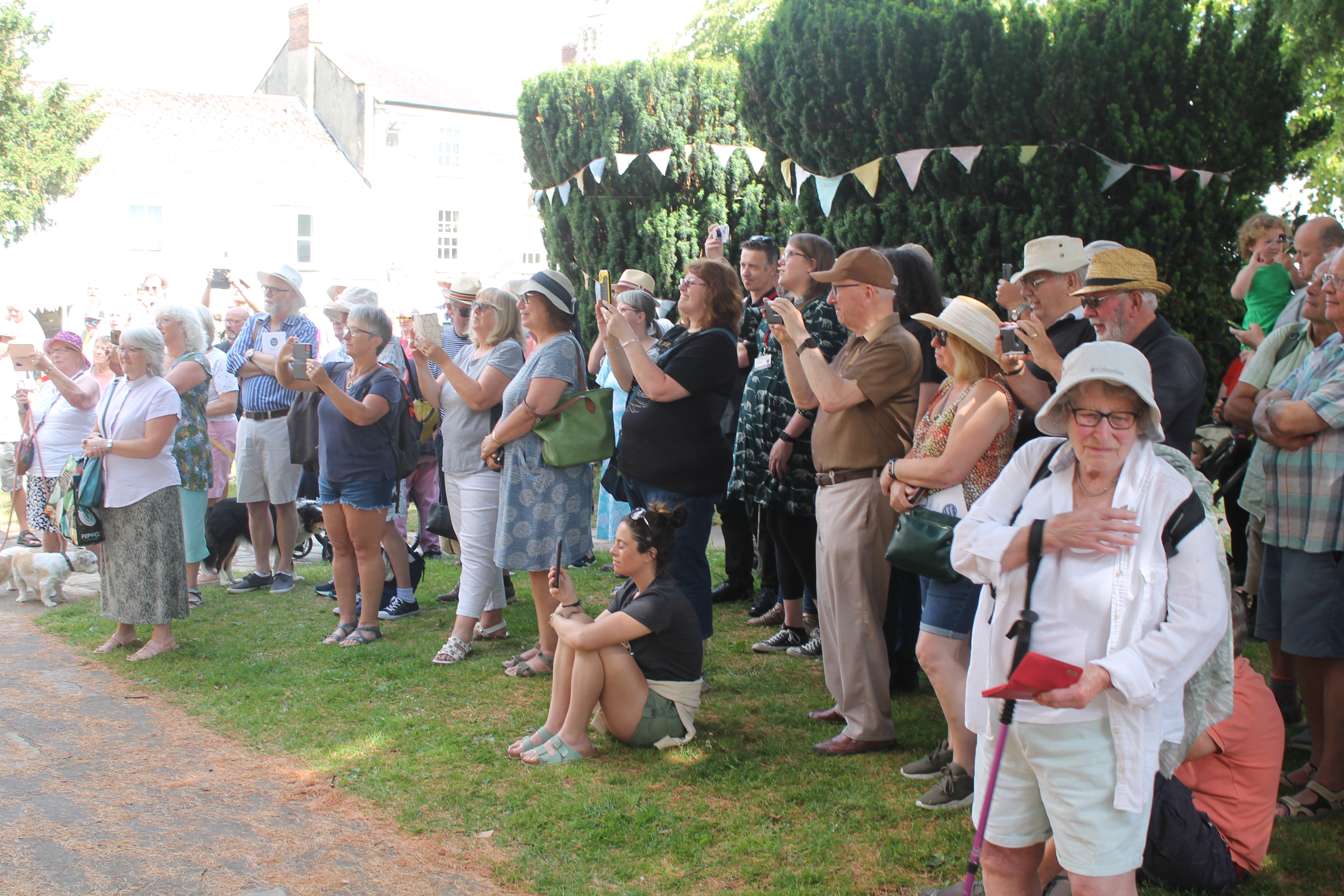 Large crowd watched the Raising of the Glove ceremony on the Minster Green