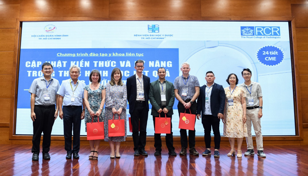 Pictured with the Vietnam team are: (3rd from left) Dr Joanna Brown - consultant radiologist, and (5th from left) Dr Andy Lowe.